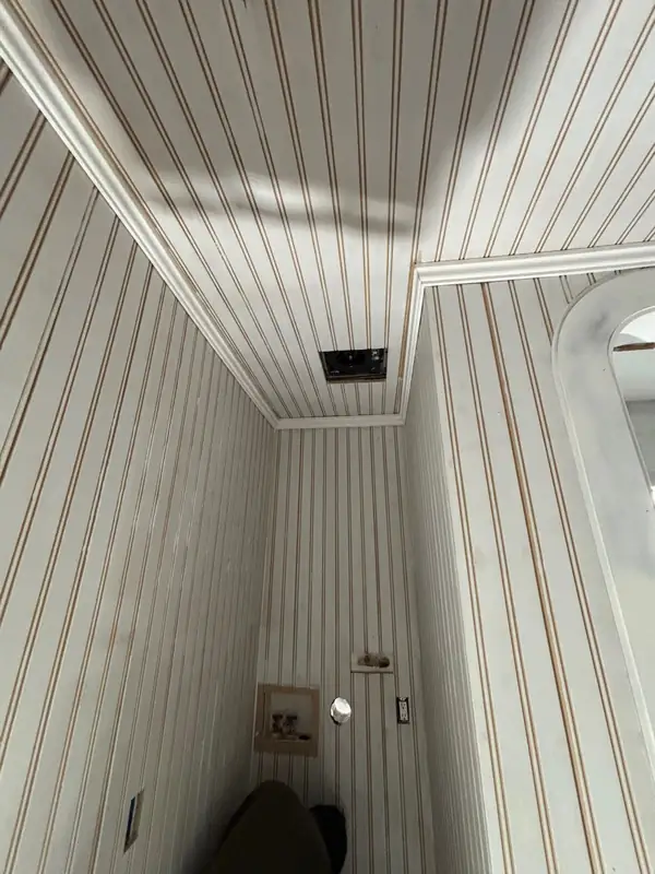 Beadboard on the walls and ceiling, ready for paint