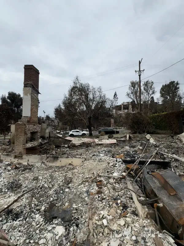 The chimney standing over the ruins of the original house